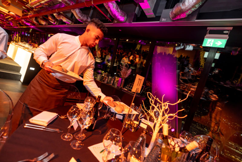 waiter serving to table